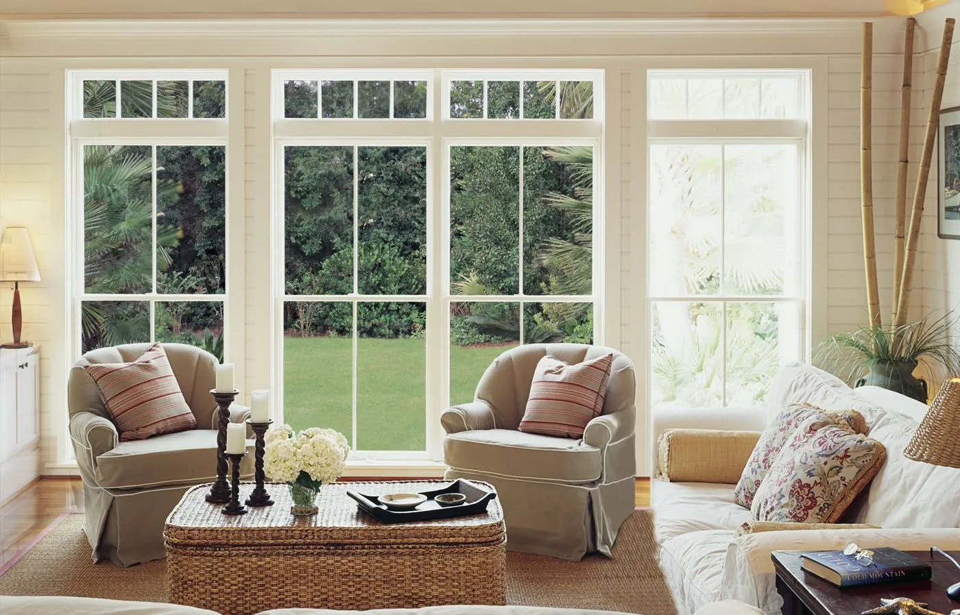 Living room with sliding windows and a garden view