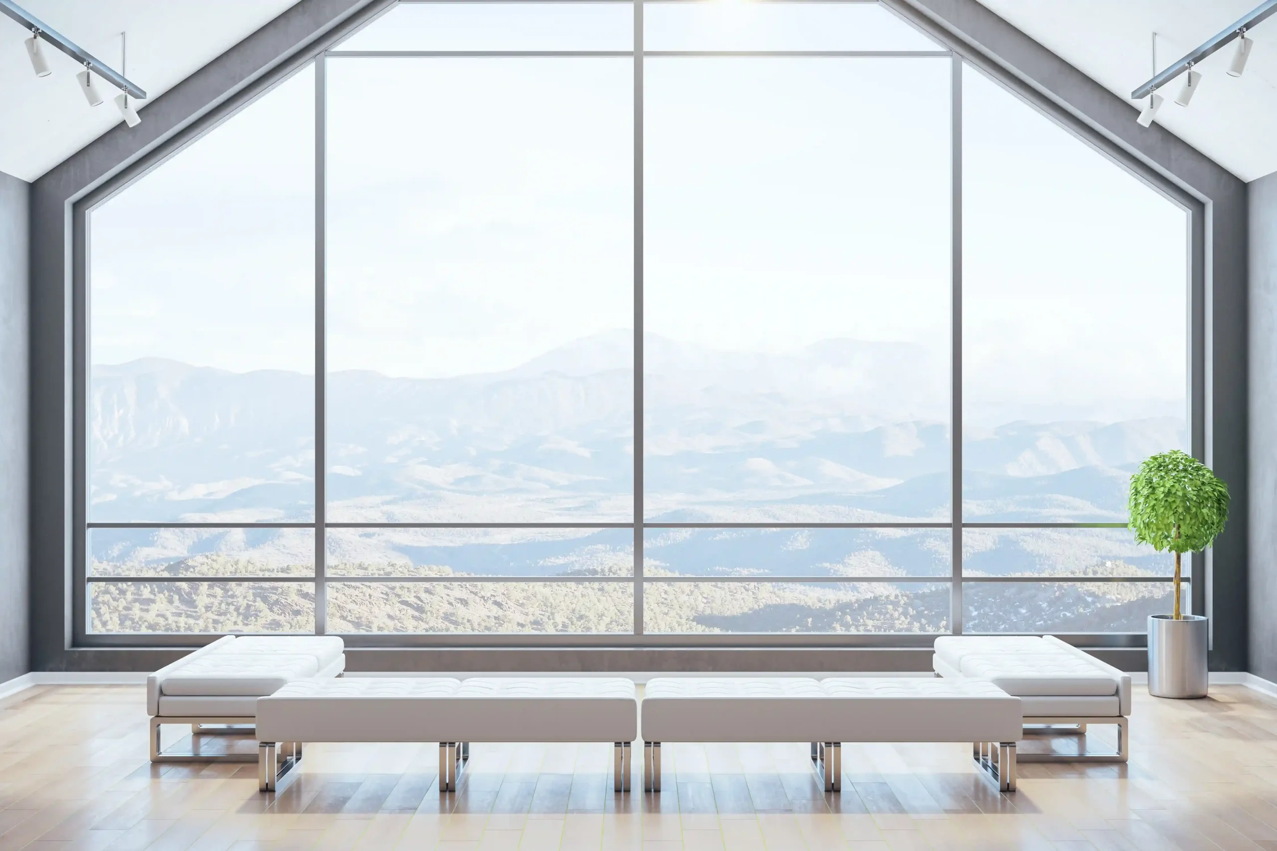 Modern attic room with panoramic picture windows