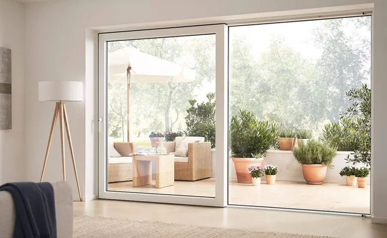 Bright patio with white lift and slide glass doors