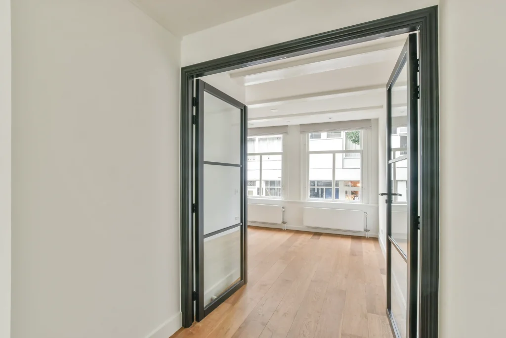 Glass swing doors in modern apartment