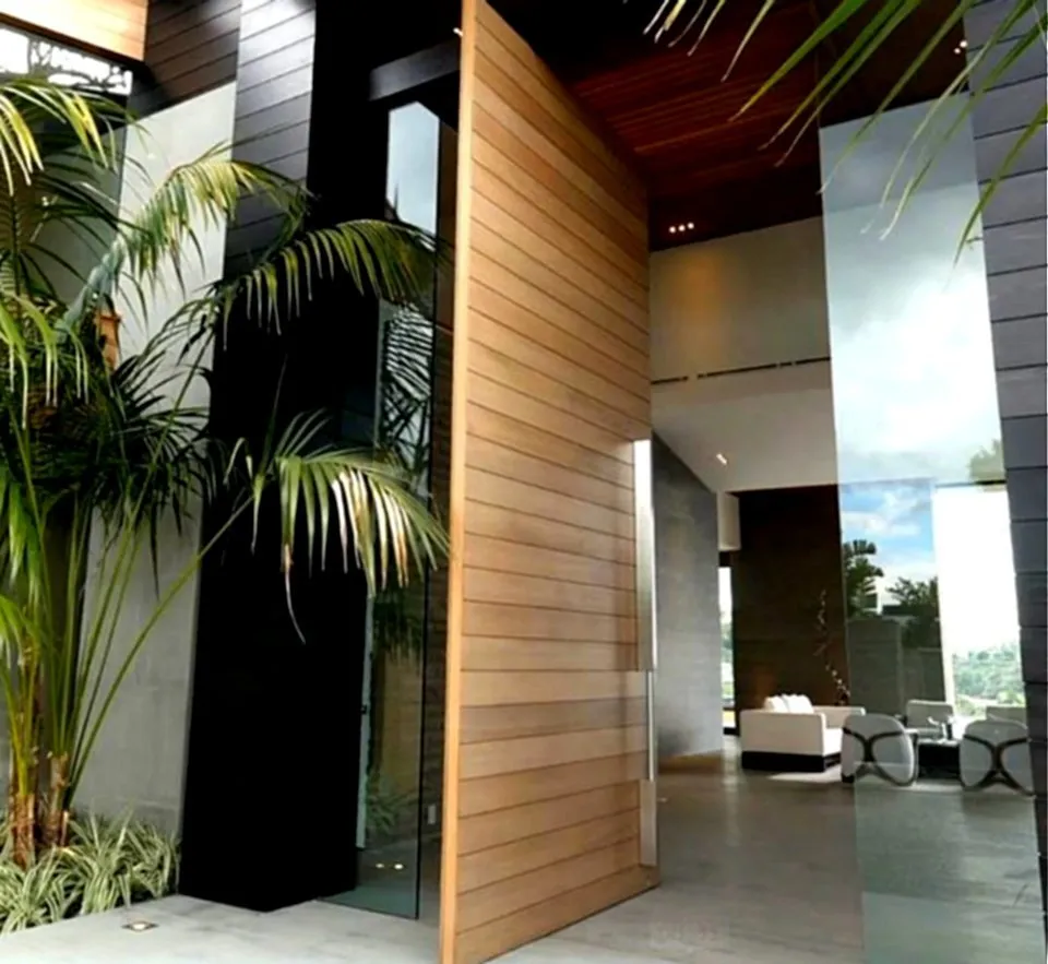 유리 측면 패널이 있는 대형 목재 피벗 현관문