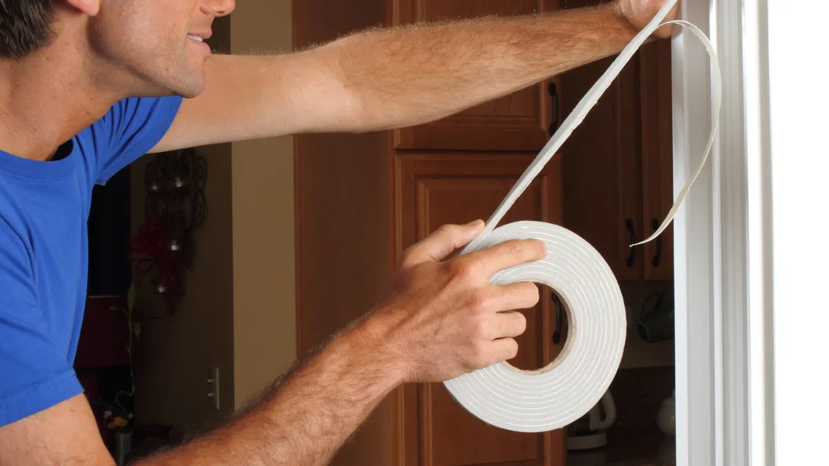 Peeling adhesive backed strip for door frame