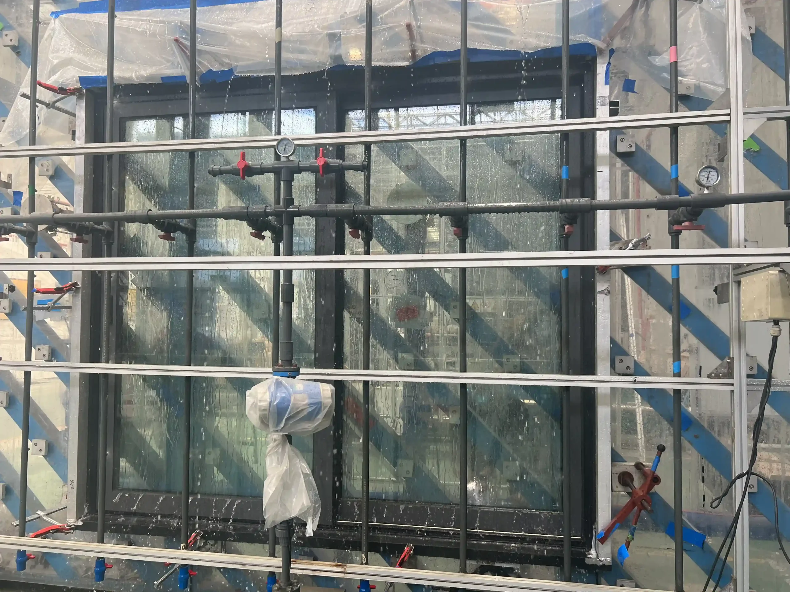 Window water resistance testing setup for certification evaluation