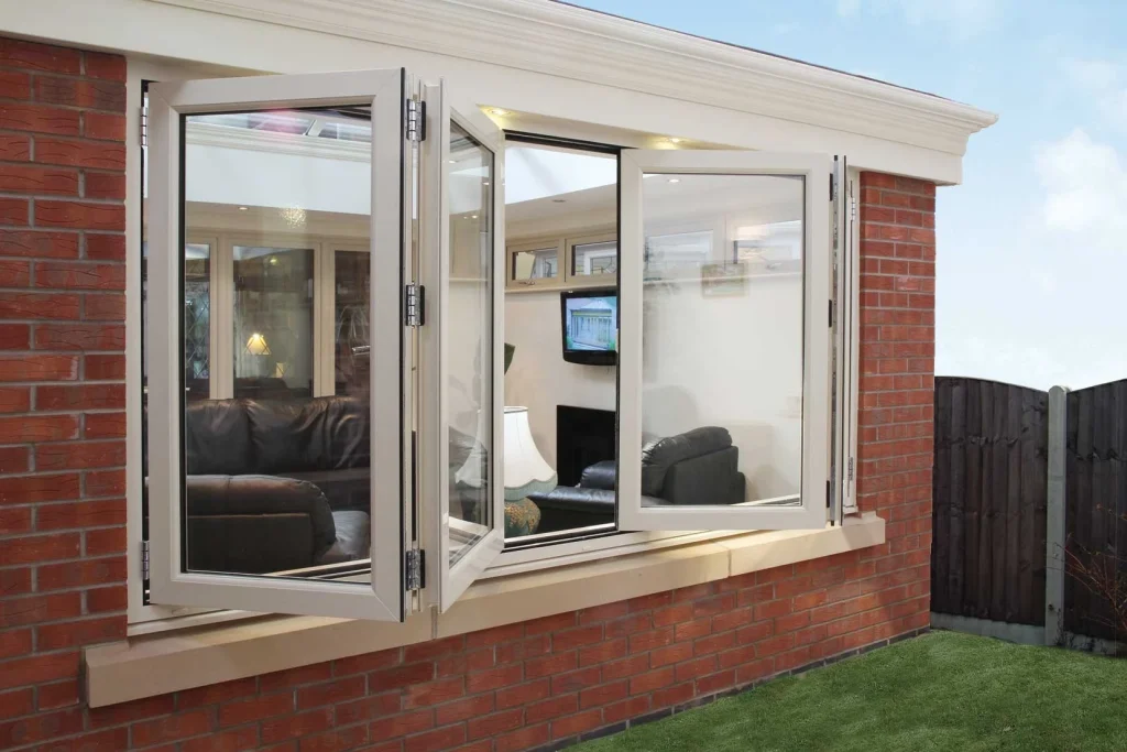 Balcony bifold window opening from brick wall exterior