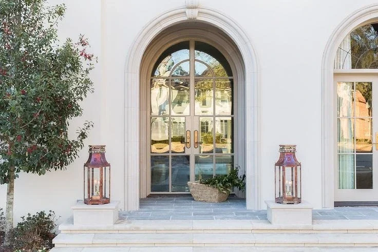 Arched French door with elegant glass panels