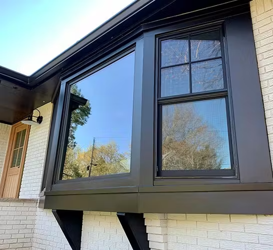 Black Framed Bay Windows Projecting Outward Black Glass Window Design