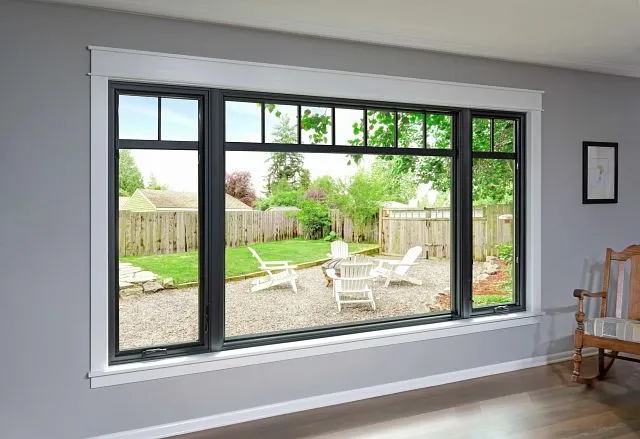 Large modern picture window installed in living room