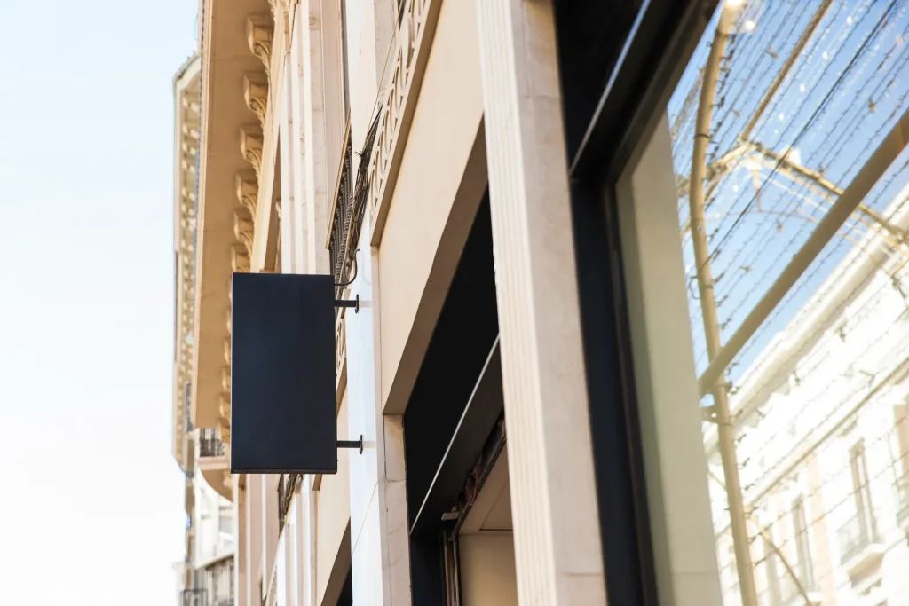 Storefront Design Ideas Blade Sign Perpendicular to the Street