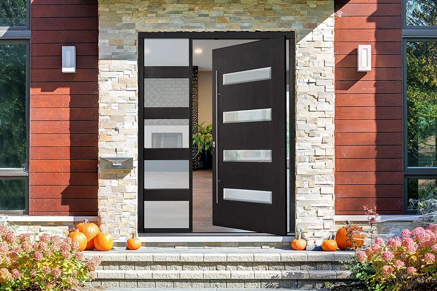 Modern inswing front door opening into home entrance