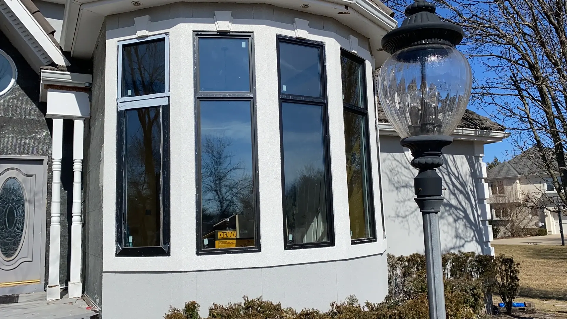 Retrofit aluminum crank casement window installation flush with existing exterior siding