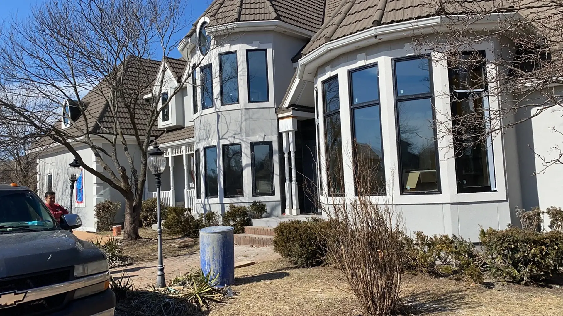 Expansive multi-lite crank casement and picture window arrangement providing natural daylight